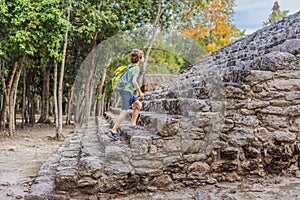 Boy tourist at Coba, Mexico. Ancient mayan city in Mexico. Coba is an archaeological area and a famous landmark of