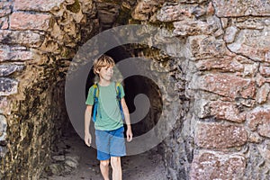 Boy tourist at Coba, Mexico. Ancient mayan city in Mexico. Coba is an archaeological area and a famous landmark of