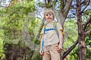 Boy tourist walking together in Montenegro. Panoramic summer landscape of the beautiful green Royal park Milocer on the