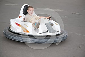 Boy on toy car