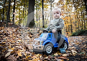 Boy with toy car