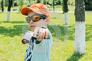 Boy with toy gun