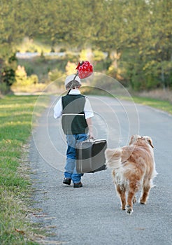 Boy Traveling with Dog