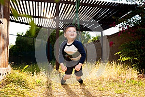 Boy Twists A Swings Chains To Spin