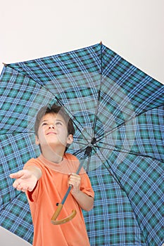 A boy with an umbrella