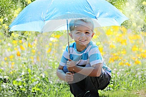 Boy with umbrella photo