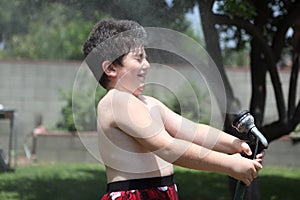 Boy under shower