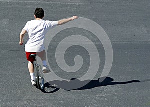 Boy on a unicycle