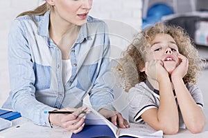 Boy unwilling to do homework