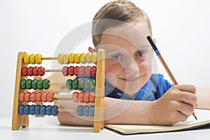 Boy using abacus