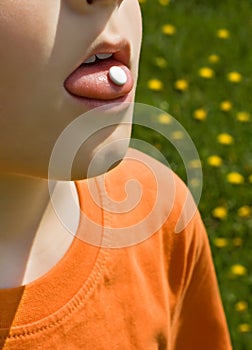 Boy using anti-allergies pill