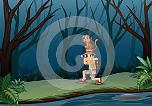 Boy using binoculars with a monkey in the dark forest