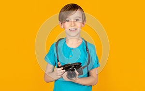Boy using a cameras. Baby boy with camera. Cheerful smiling child holding a cameras. Little boy on a taking a photo