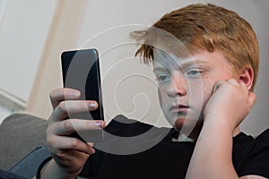 Boy Using Cellphone