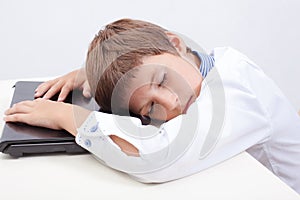 Boy using his laptop computer