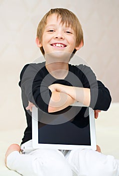 Boy using tablet computer