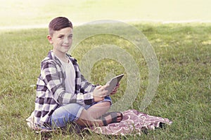 Boy using tablet pc
