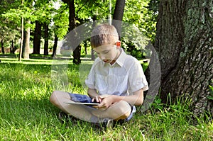 Boy using tablet pc