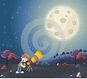 Boy using a telescope to look at the moon