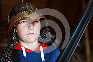 Boy in Viking helmet