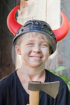 Boy in Viking helmet with horns