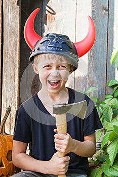 Boy in Viking helmet with horns