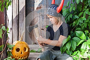 Boy in Viking helmet with horns