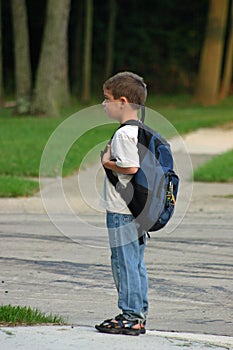 Boy Waiting on Bus