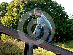 Boy walks up the stairs