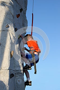 Boy Wall Climbing Outdoors