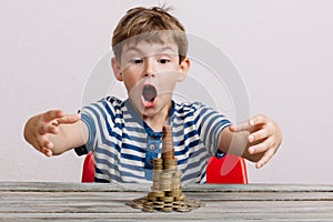 Boy wanting to take stack of money