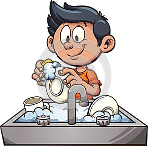 Boy washing dishes photo