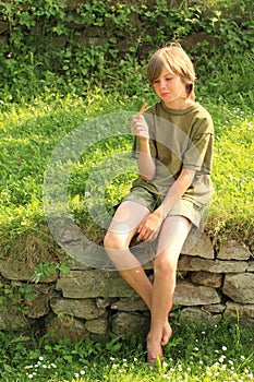 Boy watching eated ice-cream