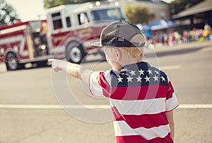 Boy watching an Independence Day Parade