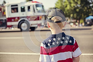 Boy watching an Independence Day Parade