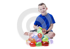 Boy with water balloons