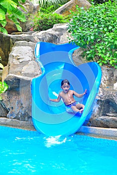 A boy on a water slide