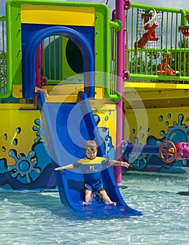 Boy on a water slide.