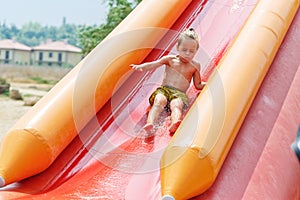 Boy on a water slide