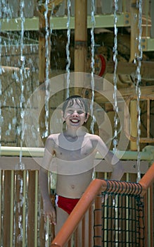 Boy in the waterpark photo