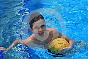 Boy with a waterpolo ball