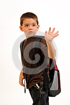 Boy waving goodbye