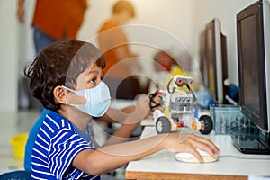 Boy wear face masks to prevent the Coronavirus 2019 COVID-19 in schools photo