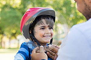 Boy wearing cycle helmet