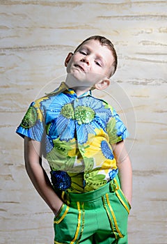 Boy Wearing Floral Print Shirt with Hands on Hips