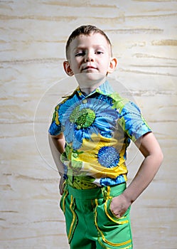 Boy Wearing Floral Print Shirt with Hands on Hips