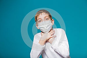 Boy wearing protection mask is short of breath