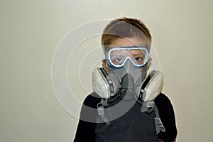 Boy wearing paint mask