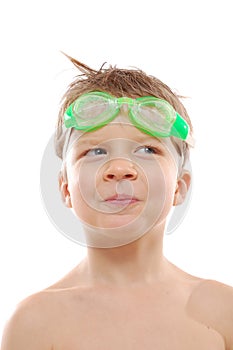 Boy wearing swimming goggles