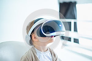 Boy wearing virtual reality glasses